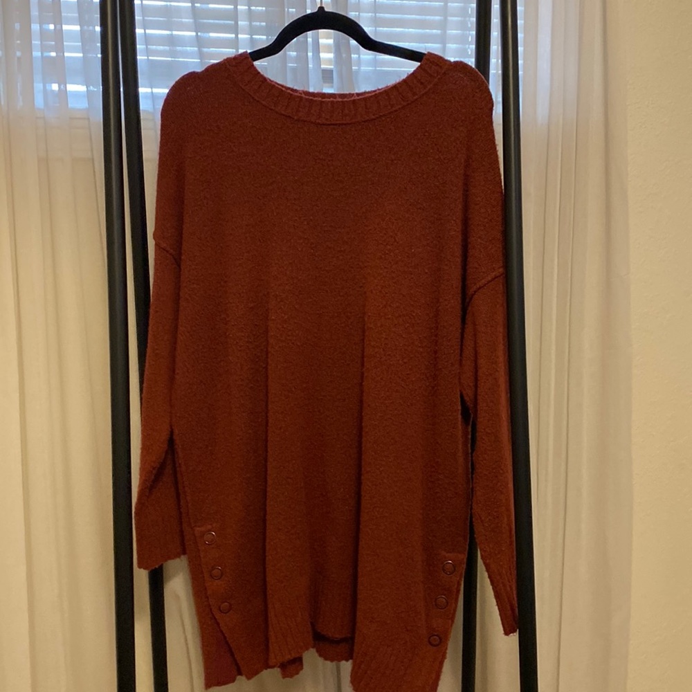 Deep red sweater or sweater dress